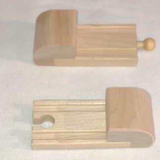 Two handmade male and two female wooden bumper stops